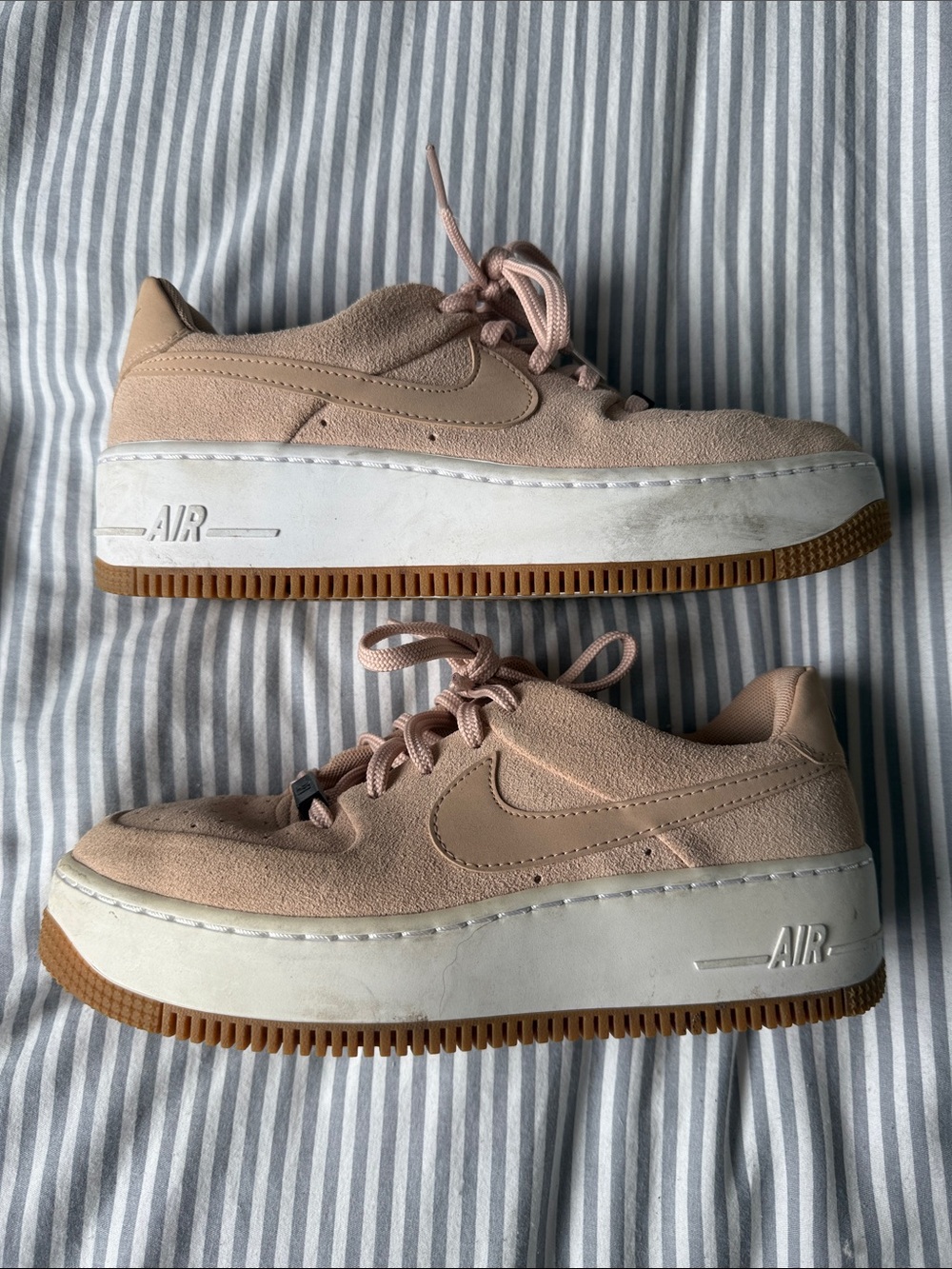 Nike Women’s Light Pink Suede Platform Sneakers
